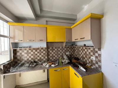 Kitchen Image of 1025 Sq.ft 2 BHK Apartment / Flat for sale in Mahagun Mantra I, Noida Extension Greater Noida for Rs. 6800000