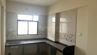 Kitchen Image of 900 Sq.ft 2 BHK Apartment / Flat for sale in Raj Tulsi Aawas, Badlapur East Badlapur for Rs. 3100000