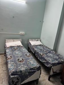 Bedroom Image of Livin Nest PG in Navalur, Chennai