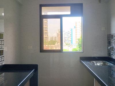 Kitchen Image of 698 Sq.ft 1 BHK Apartment / Flat for sale in Raj Nirvana Eden, Ambernath East Ambernath for Rs. 2500000