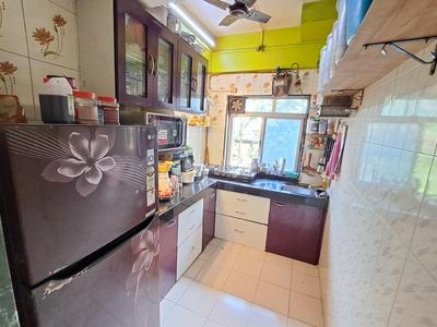 Kitchen Image of 950 Sq.ft 2 BHK Apartment / Flat for sale in Gharkul Complex, Kharghar Navi Mumbai for Rs. 8500000