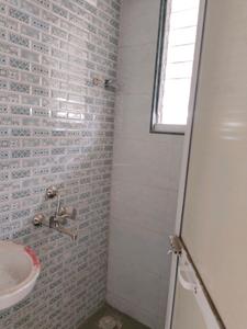 Common Bathroom Image of 695 Sq.ft 1 BHK Apartment / Flat for sale in Ulwe Navi Mumbai for Rs. 4800000