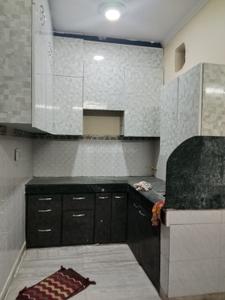 Kitchen Image of 650 Sq.ft 1 BHK Builder Floor for rent in Dwarka Mor New Delhi for Rs. 11500
