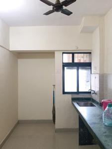Kitchen Image of 600 Sq.ft 1 BHK Apartment / Flat for rent in Puraniks Kanchan Pushp Society, Kasarvadavali Thane for Rs. 20000