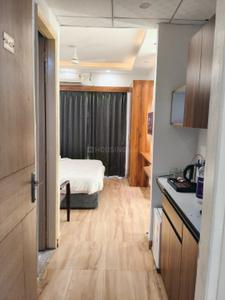 Bedroom Image of 650 Sq.ft 1 RK Apartment / Flat for rent in Godrej The Suites, Jaypee Greens Greater Noida for Rs. 29000