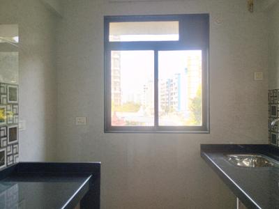 Kitchen Image of 704 Sq.ft 1 BHK Apartment / Flat for sale in APR Yashogad Pride, Dombivli East Thane for Rs. 5320000