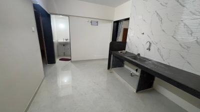 Kitchen Image of 950 Sq.ft 2 BHK Apartment / Flat for rent in JND Wisteria, Ambegaon Budruk Pune for Rs. 22000