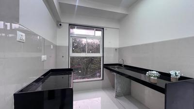 Kitchen Image of 750 Sq.ft 2 BHK Apartment / Flat for sale in Shreejee Skymont Siddhi, Dahisar East Mumbai for Rs. 16000000