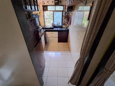 Kitchen Image of 950 Sq.ft 2 BHK Apartment / Flat for sale in Gharkul Complex, Kharghar Navi Mumbai for Rs. 8500000