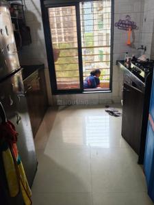 Kitchen Image of 950 Sq.ft 2 BHK Apartment / Flat for rent in PIL Krishna Dham, Mira Road East Mira Bhayandar for Rs. 30000