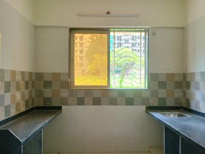 Kitchen Image of 688 Sq.ft 1 BHK Apartment / Flat for sale in Amrut Laxmi Raj Regalia Phase I, Ambernath East Ambernath for Rs. 2450000