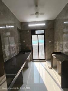 Kitchen Image of 816 Sq.ft 2 BHK Apartment / Flat for sale in Om Swayambhu Siddhivinayak Balaji Residency 2, Thakurli Thane for Rs. 6490000