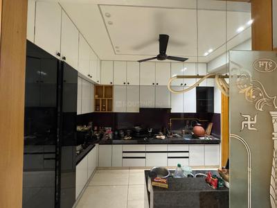 Kitchen Image of 1050 Sq.ft 2 BHK Apartment / Flat for rent in Navkar Kala Dham, Chandkheda Ahmedabad for Rs. 30000