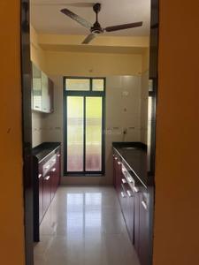 Kitchen Image of 930 Sq.ft 2 BHK Apartment / Flat for sale in Agarwal Doshi Complex, Vasai West Vasai for Rs. 8700000