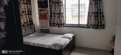 Bedroom Image of 790 Sq.ft 2 BHK Apartment / Flat for sale in Seven Eagle Corporation Om Residency, Nana Varachha Surat for Rs. 4200000