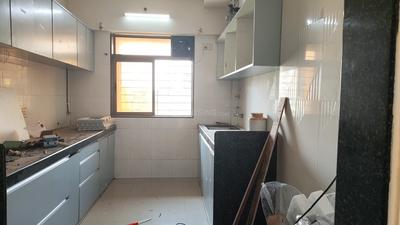 Kitchen Image of 1050 Sq.ft 2 BHK Apartment / Flat for rent in Pratik Gems, Kamothe Navi Mumbai for Rs. 32000