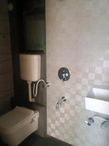 Common Bathroom Image of 675 Sq.ft 1 BHK Apartment / Flat for sale in Amrut Laxmi Raj Regalia Phase I, Ambernath East Ambernath for Rs. 2400000