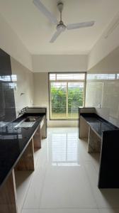 Kitchen Image of 900 Sq.ft 2 BHK Apartment / Flat for sale in Mohan Alcoves I, Badlapur West Badlapur for Rs. 3800000