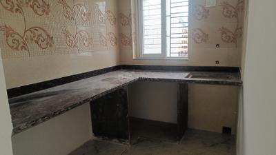 Kitchen Image of 940 Sq.ft 2 BHK Apartment / Flat for sale in New Town Kolkata for Rs. 7050000