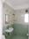 Meera Bai Apartments Attached Bathroom with Bedroom One 3