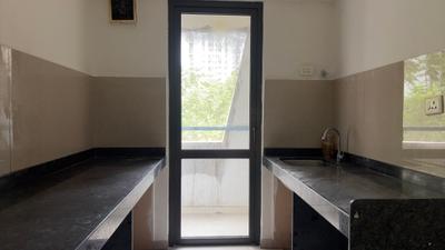 Kitchen Image of 891 Sq.ft 1.5 BHK Apartment / Flat for sale in Lodha Lakeshore Greens, Palava Phase 2 Thane for Rs. 4100000