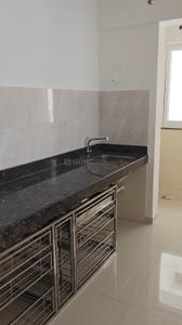 Kitchen Image of 950 Sq.ft 2 BHK Apartment / Flat for sale in K Raheja Sterling Tower 2, Mohammed Wadi Pune for Rs. 8500000