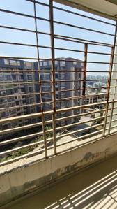 Balcony Image of 1350 Sq.ft 2 BHK Apartment / Flat for rent in Devjit Pramukh Green Plus Bldg H, Chala Vapi for Rs. 17500