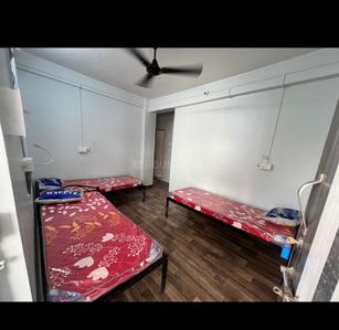 Bedroom Image of SK Boys PG in Shukrawar Peth, Pune