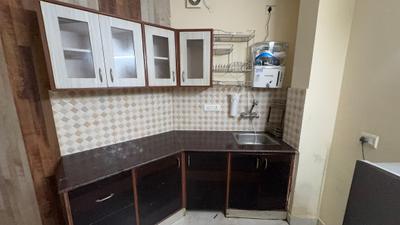 Kitchen Image of 600 Sq.ft 1 BHK Apartment / Flat for rent in Sushant Lok Phase 1 Gurgaon for Rs. 29000