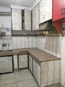 Kitchen Image of 650 Sq.ft 2 BHK Builder Floor for sale in Mahavir Enclave New Delhi for Rs. 3800000