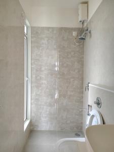 Common Bathroom Image of 863 Sq.ft 2 BHK Apartment / Flat for sale in Ashar Arize Tower B And C, Kalwa Thane for Rs. 15300000