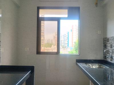 Kitchen Image of 720 Sq.ft 1 BHK Apartment / Flat for sale in Krishna Ultima, Kalyan East Kalyan for Rs. 4400000
