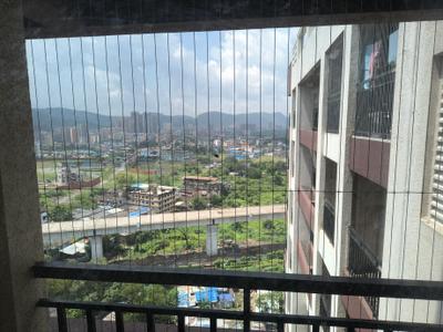 Balcony Image of 1090 Sq.ft 2 BHK Apartment / Flat for rent in National Trinity Paradise Phase 1, Shilphata Thane for Rs. 17500