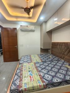 Bedroom Image of 700 Sq.ft 2 BHK Builder Floor for rent in Sector 7 Rohini New Delhi for Rs. 35000