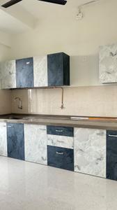 Kitchen Image of 900 Sq.ft 2 BHK Apartment / Flat for rent in Rosa Manhattan Phase 2, Hiranandani Estate Thane for Rs. 42000