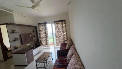 Living Room Image of 600 Sq.ft 2 BHK Apartment / Flat for rent in Kolte Patil Life Republic Sector R16 16th Avenue Arezo M Building, Marunji Pune for Rs. 25000