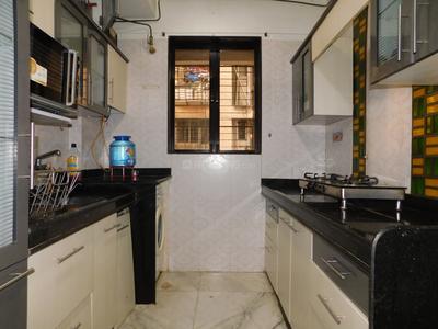 Kitchen Image of 590 Sq.ft 1 BHK Apartment / Flat for rent in CMG Girnar Tower, Mazgaon Mumbai for Rs. 65000