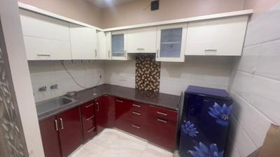 Kitchen Image of 900 Sq.ft 2.5 BHK Builder Floor for rent in Pitampura New Delhi for Rs. 35000