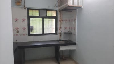 Kitchen Image of 550 Sq.ft 1 BHK Apartment / Flat for rent in Bhakti Park, Kasarvadavali Thane for Rs. 18000