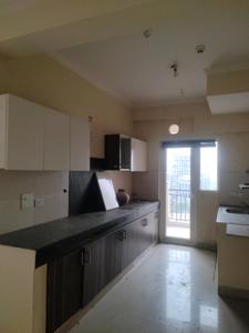 Kitchen Image of 1360 Sq.ft 3 BHK Apartment / Flat for sale in Paramount Floraville, Sector 137 Noida for Rs. 16500000
