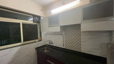 Kitchen Image of 750 Sq.ft 1 BHK Apartment / Flat for rent in Mohan Willows, Badlapur East Badlapur for Rs. 9000