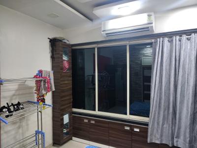 Bedroom Image of 700 Sq.ft 1 BHK Apartment / Flat for rent in Paradigm Pushpanjali Residency Phase III, Kasarvadavali Thane for Rs. 16548