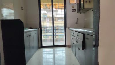 Kitchen Image of 1250 Sq.ft 2 BHK Apartment / Flat for rent in Basil Tower, Kamothe Navi Mumbai for Rs. 30000