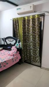 Bedroom Image of 1260 Sq.ft 3 BHK Apartment / Flat for sale in Ulhasnagar Thane for Rs. 7500000