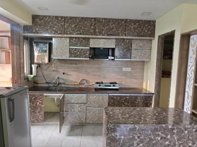 Kitchen Image of 850 Sq.ft 2 BHK Apartment / Flat for rent in Rushabhdev Sharan Circle Homes, Chandkheda Ahmedabad for Rs. 28500