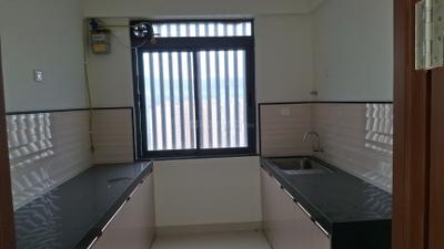 Kitchen Image of 850 Sq.ft 2 BHK Apartment / Flat for rent in Dynamix Divum, Malad East Mumbai for Rs. 70000