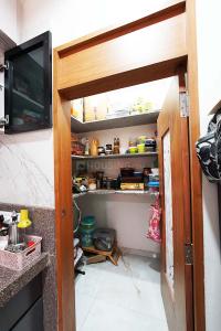 Kitchen Image of 1584 Sq.ft 2 BHK Apartment / Flat for sale in Swara Sargam, Sargasan Gandhinagar for Rs. 8800000