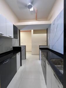 Kitchen Image of 730 Sq.ft 1 BHK Apartment / Flat for sale in Mohan Precious Greens, Ambernath East Ambernath for Rs. 3500000