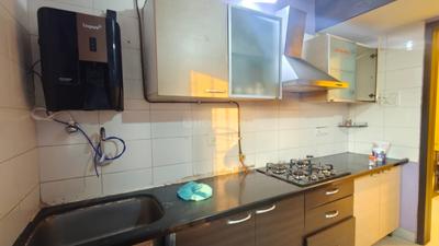 Kitchen Image of 650 Sq.ft 2 BHK Apartment / Flat for rent in R W Devashree Park, Thane West Thane for Rs. 42000