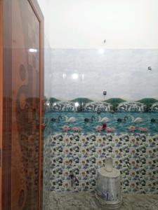 Common Bathroom Image of 600 Sq.ft 2 BHK Apartment / Flat for sale in Purba Barisha Kolkata for Rs. 1900000